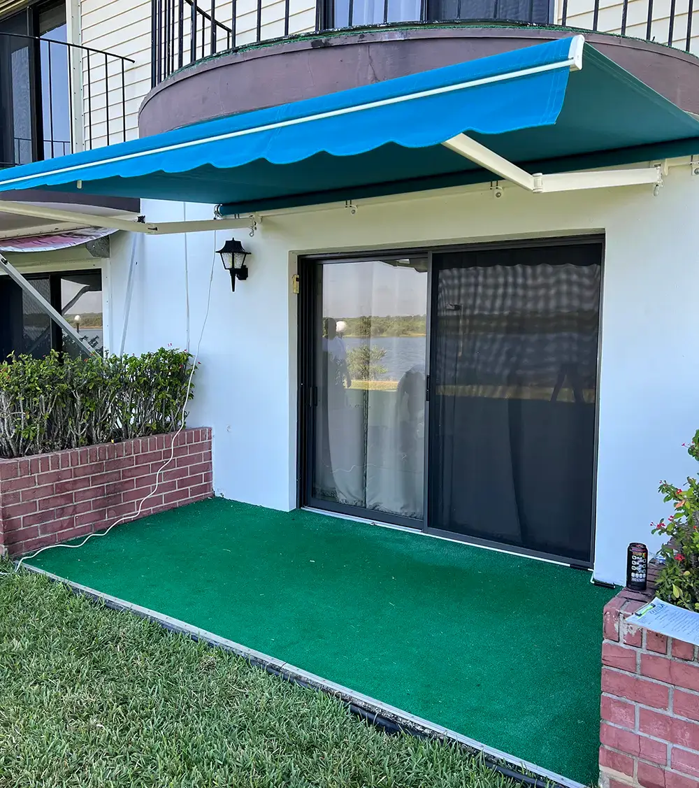 Blue Motorized Awning - Flagler Beach Florida