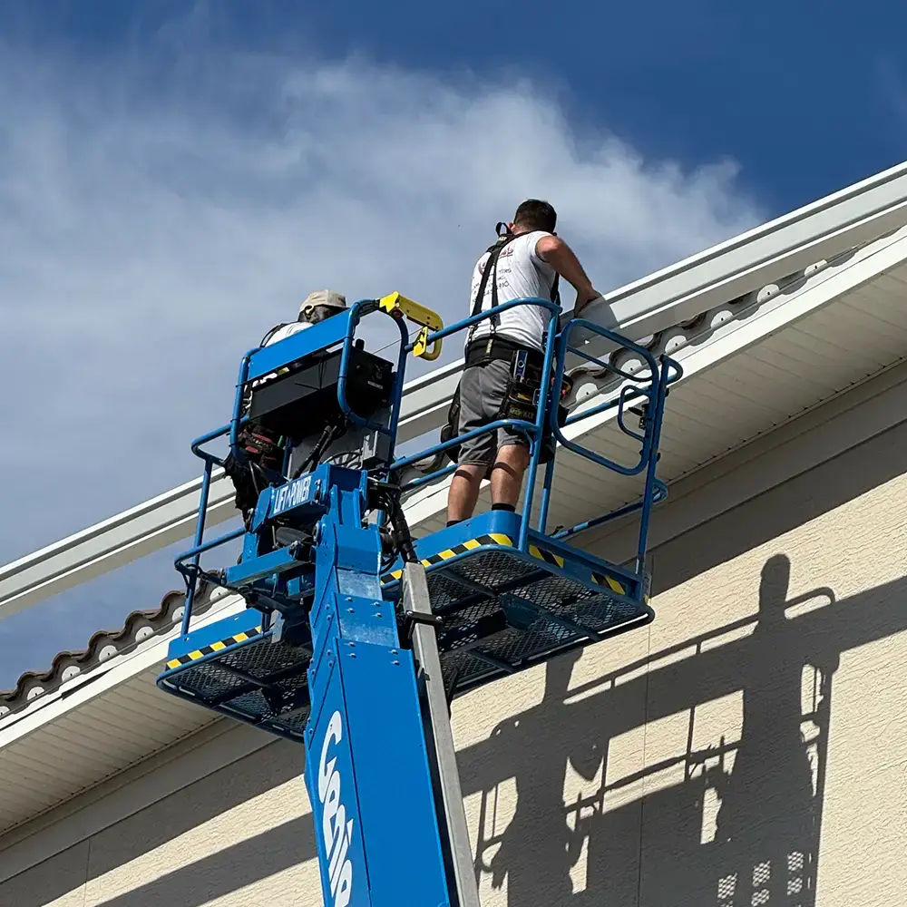 Commercial gutter installation on boom - Palm Coast Florida